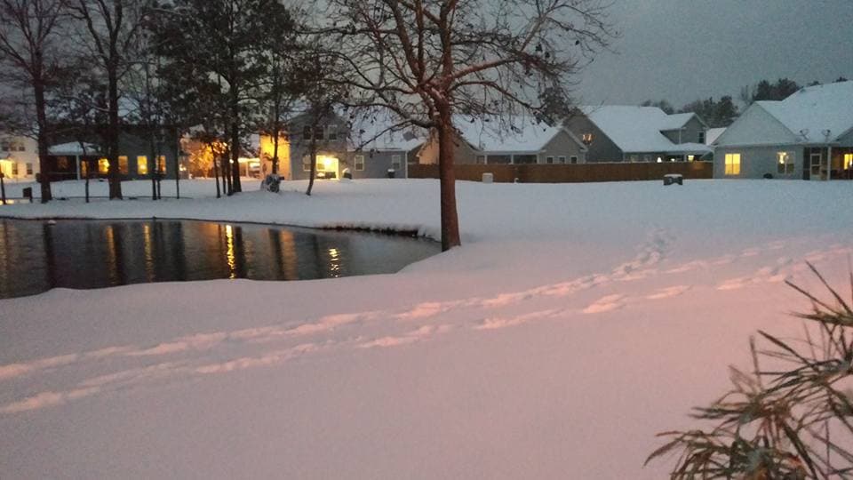 Strawberry Station pond at twilight after a snowfall